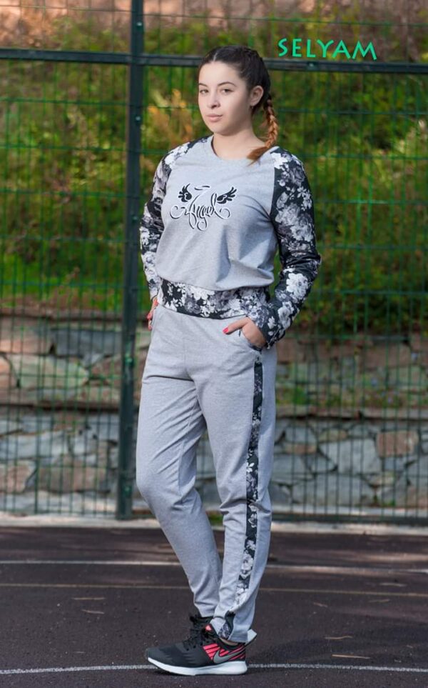 img src="дамски.jpg" alt="дамски спортен екип ангел">